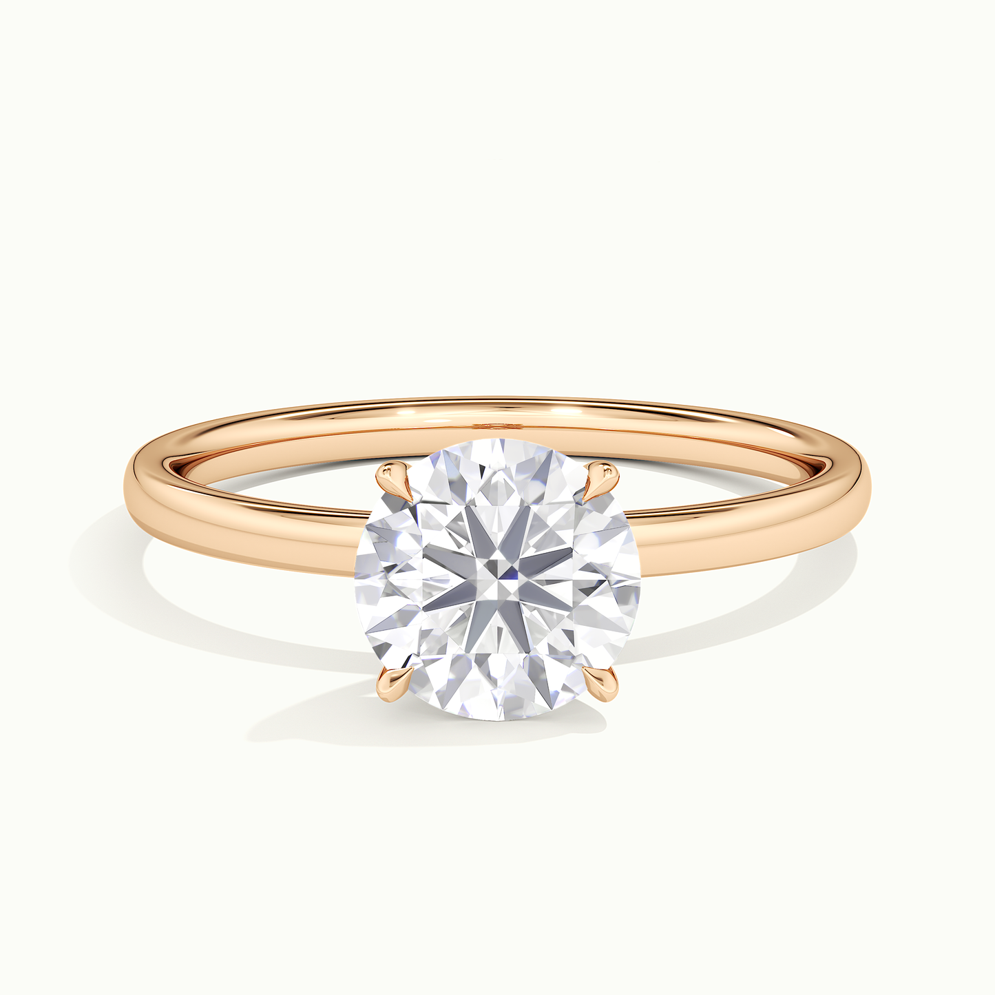 Rose gold round brilliant-cut hidden halo engagement ring, front view