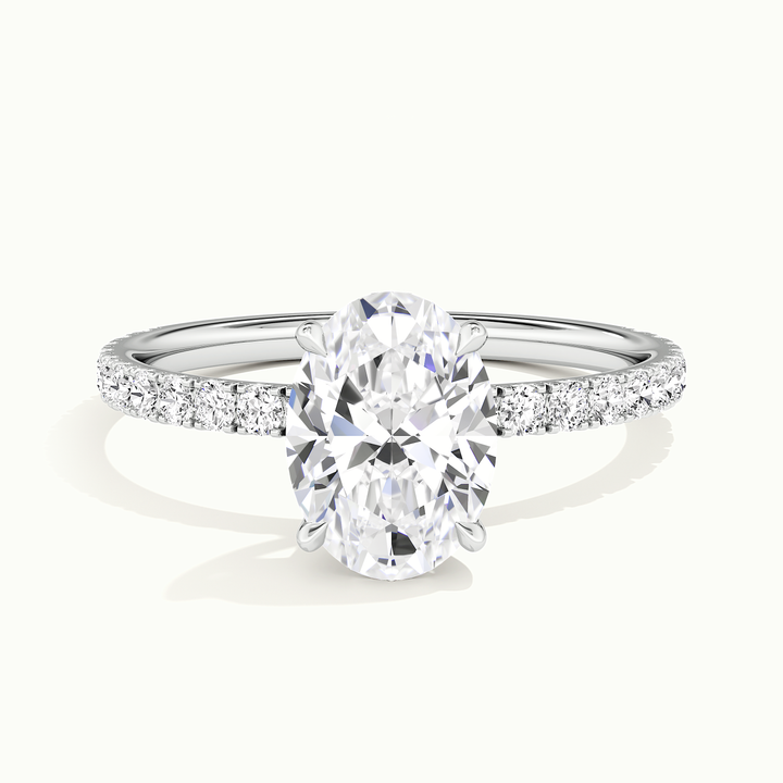 White gold oval-cut pave hidden halo engagement ring, front view