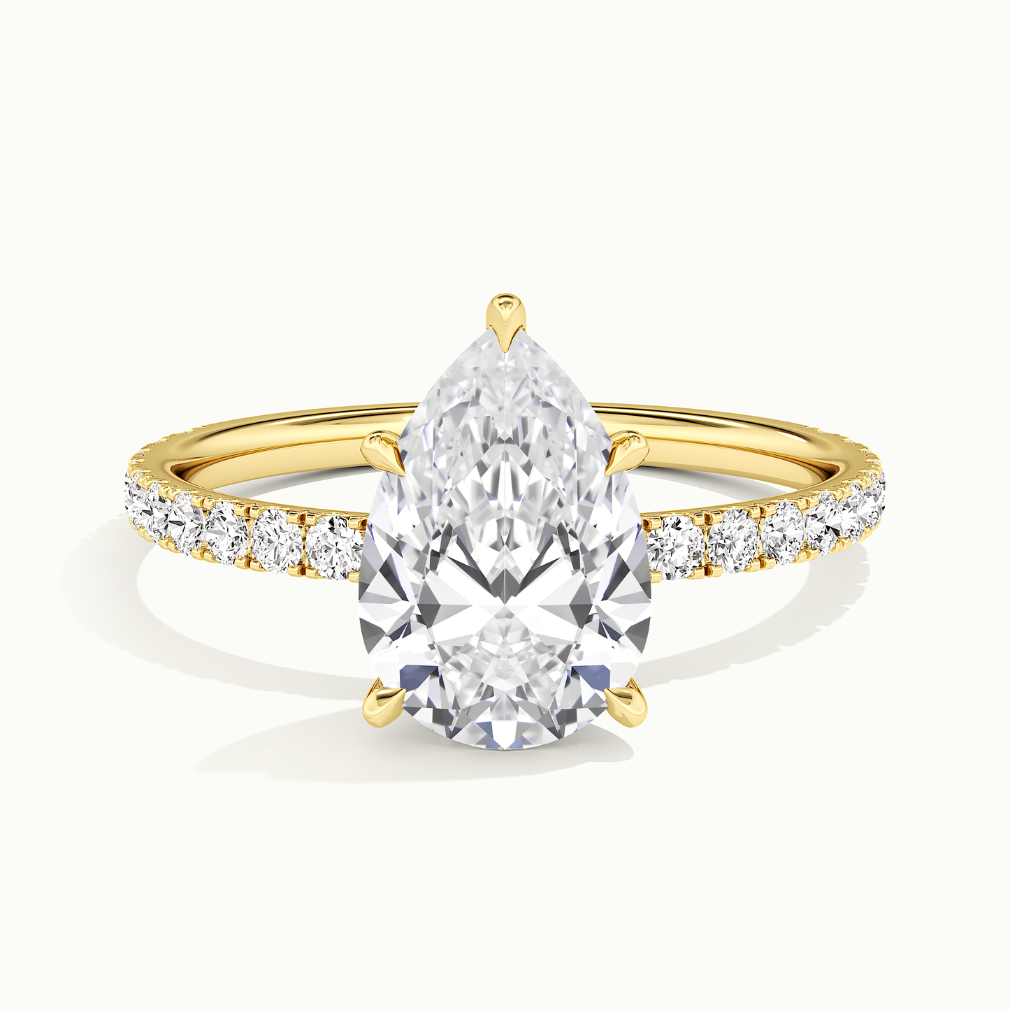 Yellow gold pear-cut pave hidden halo engagement ring, front view