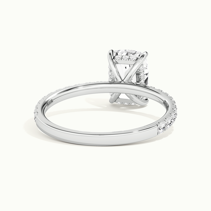 White gold elongated cushion-cut pave hidden halo engagement ring, side profile showing setting height