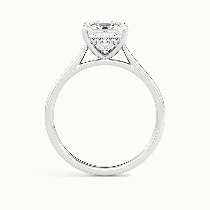 White gold princess-cut cathedral hidden halo engagement ring, side profile showing setting height