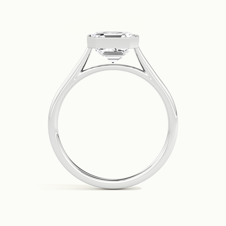 White gold Asscher-cut bezel-set solitaire engagement ring, side profile showing the bezel setting height