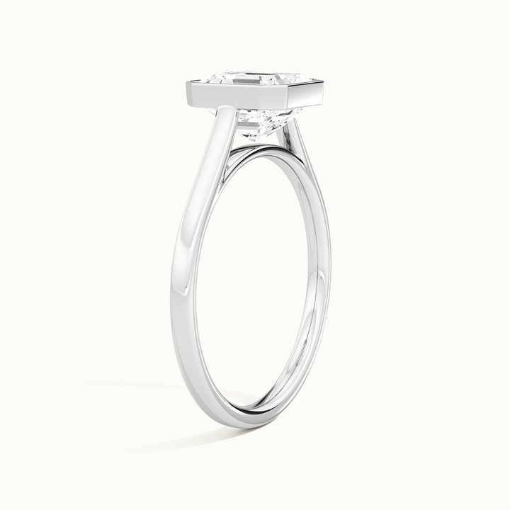 White gold Asscher-cut bezel-set solitaire engagement ring, raised three-quarter view of the setting
