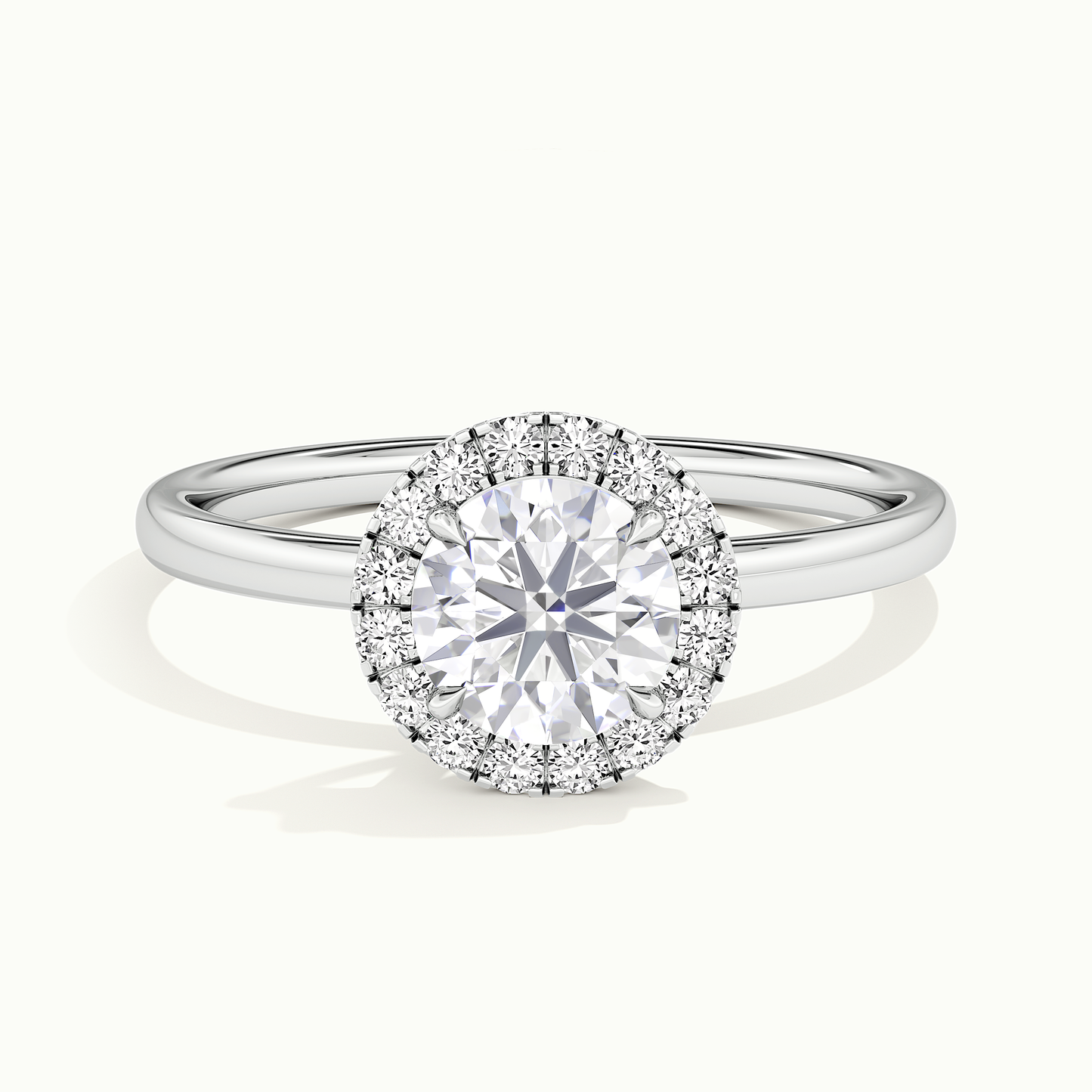 White gold round brilliant-cut halo engagement ring, front view