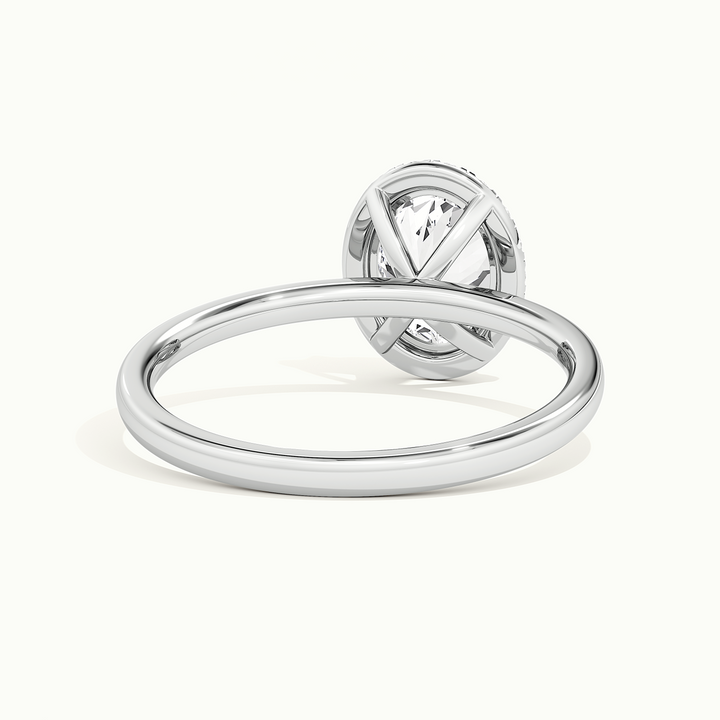 White gold oval-cut halo engagement ring, rear view showing the setting gallery