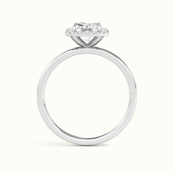 White gold radiant-cut halo engagement ring, side profile showing setting height