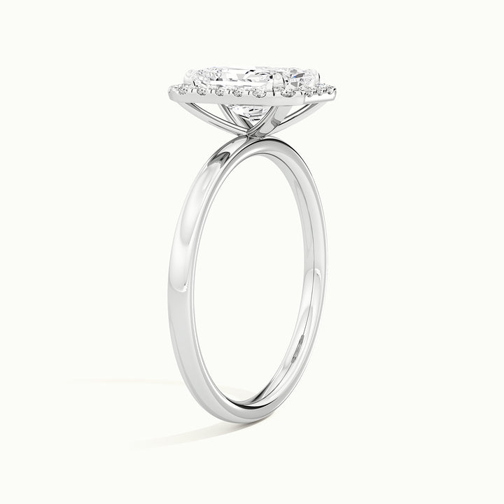 White gold radiant-cut halo engagement ring, raised three-quarter view of the setting