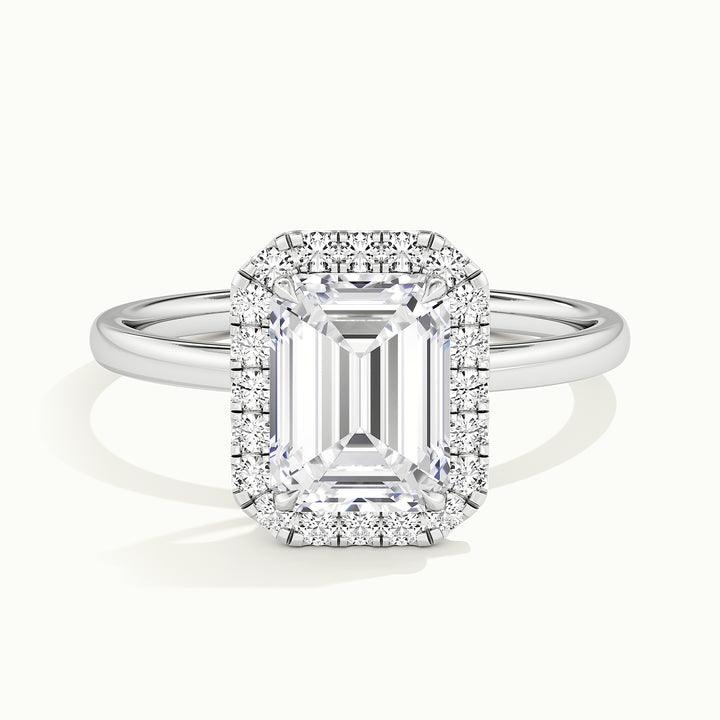 White gold emerald-cut halo engagement ring, front view