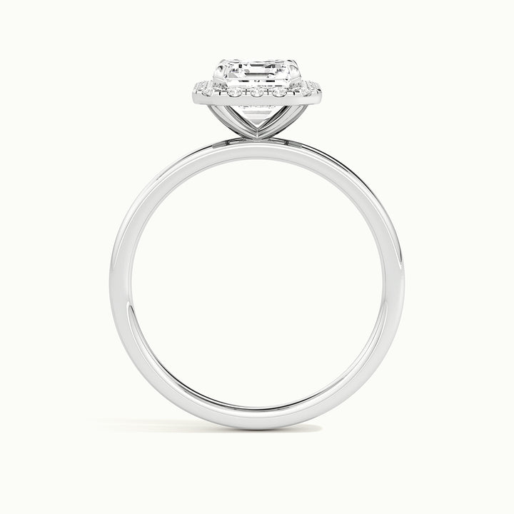 White gold emerald-cut halo engagement ring, side profile showing setting height