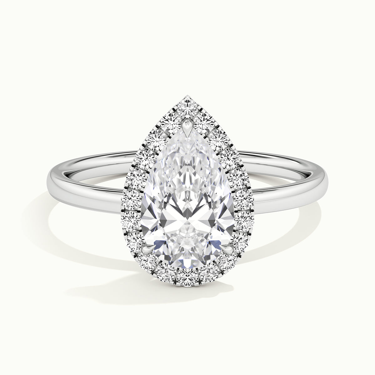 White gold pear-cut halo engagement ring, front view