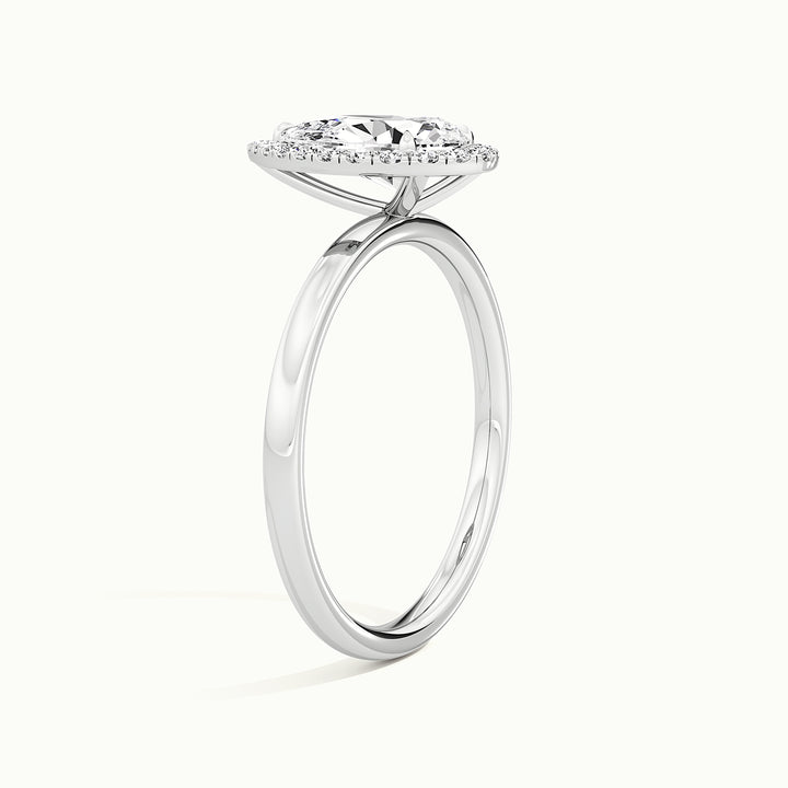 White gold pear-cut halo engagement ring, raised three-quarter view of the setting