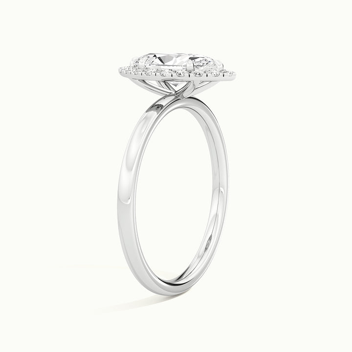 White gold marquise-cut halo engagement ring, raised three-quarter view of the setting
