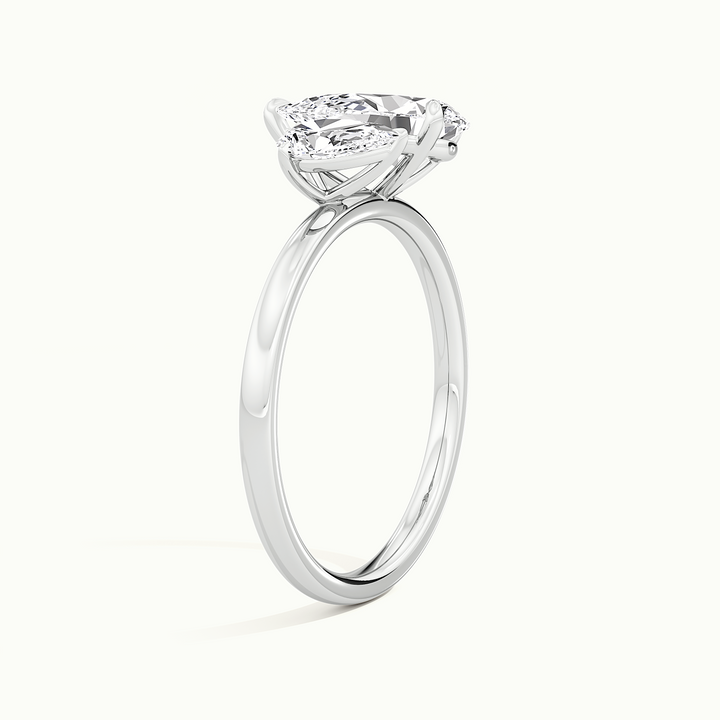 White gold toi et moi double pear two-stone engagement ring, raised three-quarter view of the setting