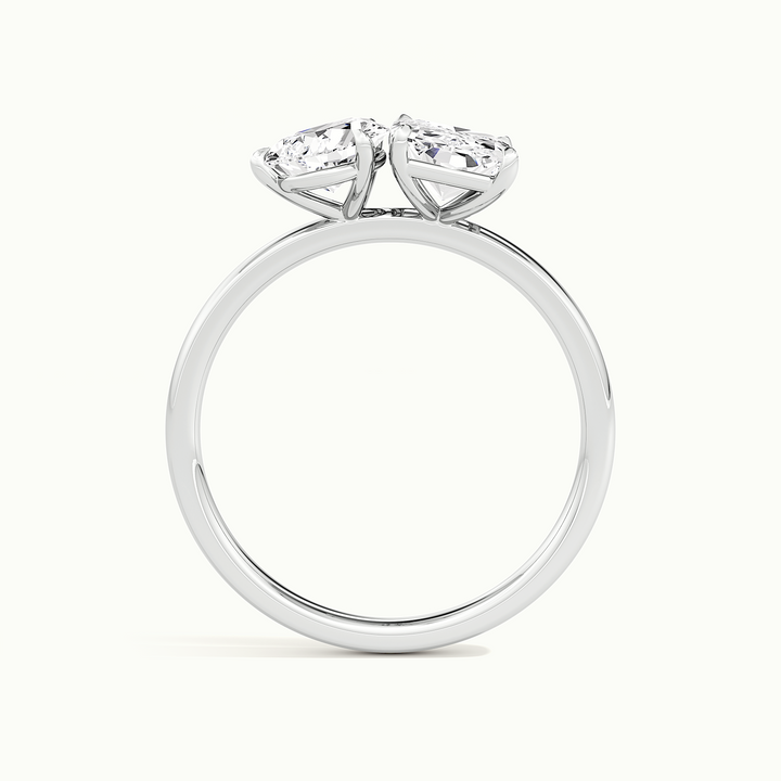 White gold toi et moi pear-and-radiant two-stone engagement ring, raised three-quarter view of the setting
