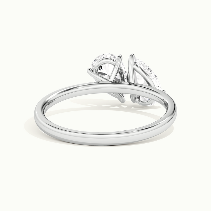 White gold toi et moi double pear two-stone engagement ring, side profile showing setting height