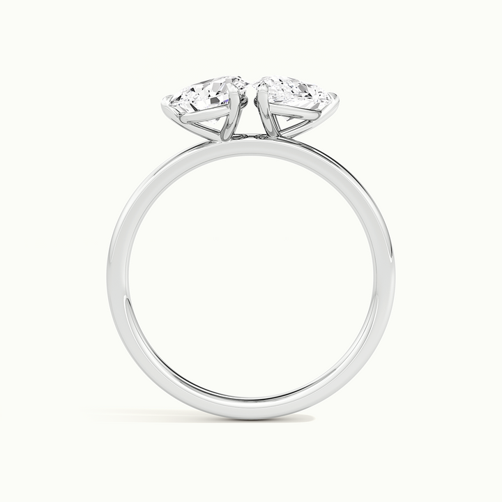White gold toi et moi double pear two-stone engagement ring, raised three-quarter view of the setting