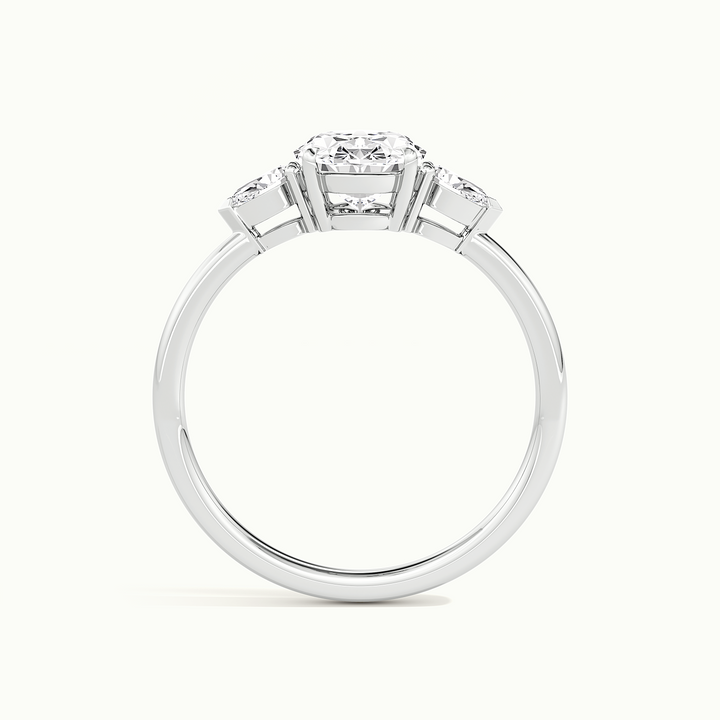 White gold oval-cut three-stone engagement ring, side profile showing setting height