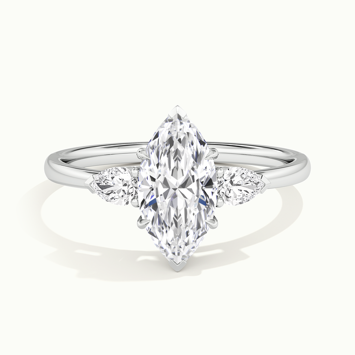 White gold marquise-cut three-stone engagement ring, front view