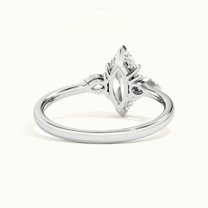 White gold marquise-cut three-stone engagement ring, rear view showing the setting gallery