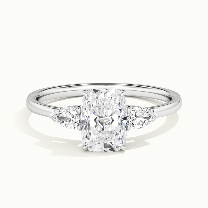 White gold elongated cushion-cut three-stone engagement ring, front view