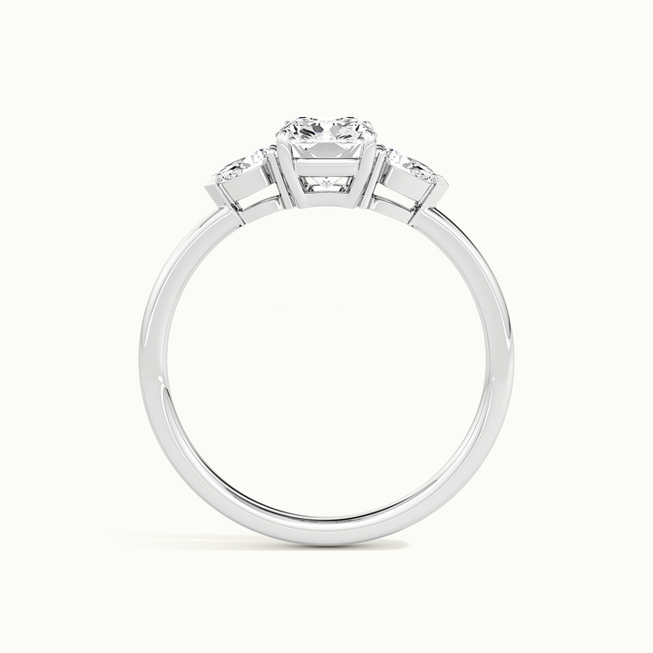 White gold elongated cushion-cut three-stone engagement ring, side profile showing setting height