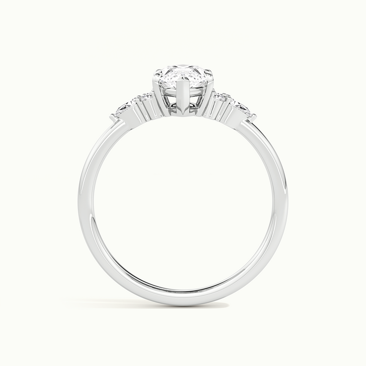 White gold marquise-cut three-stone engagement ring, side profile showing setting height