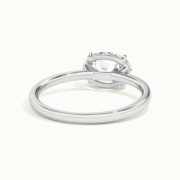 White gold oval-cut east-west solitaire engagement ring, rear view showing the setting gallery