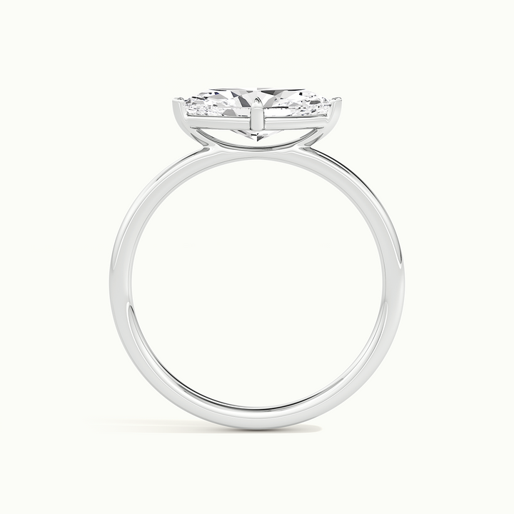White gold marquise-cut east-west solitaire engagement ring, side profile showing setting height