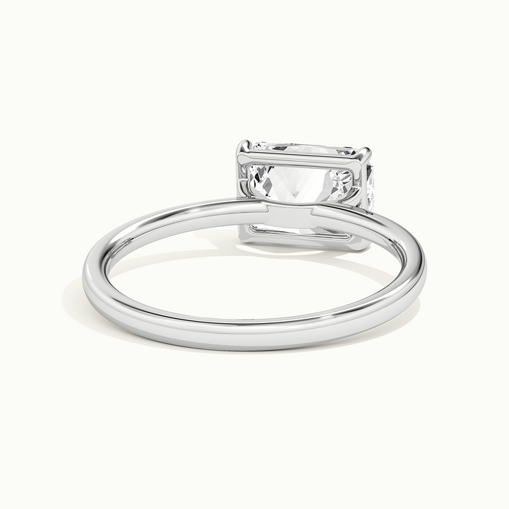 White gold radiant-cut east-west solitaire engagement ring, rear view showing the setting gallery