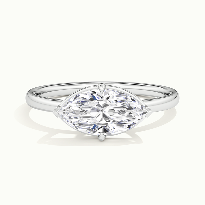 White gold marquise-cut east-west bezel-frame solitaire engagement ring, front view