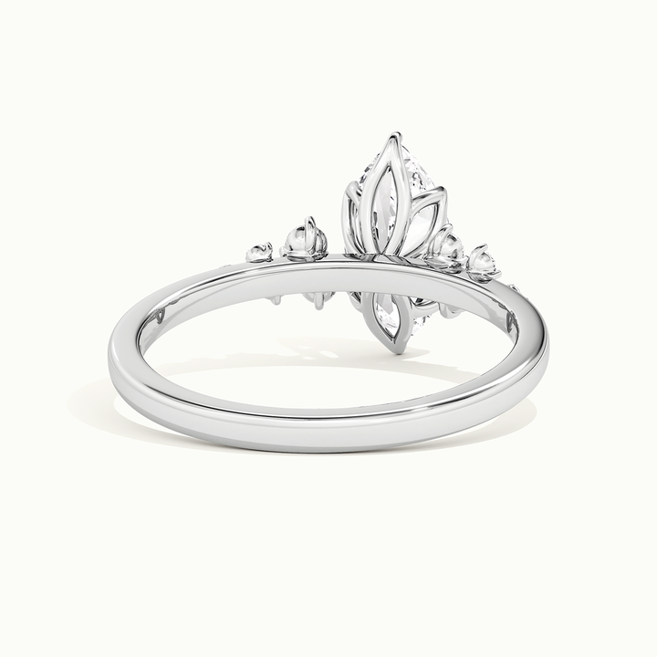 White gold marquise-cut side-stone cluster engagement ring, rear view showing the setting gallery