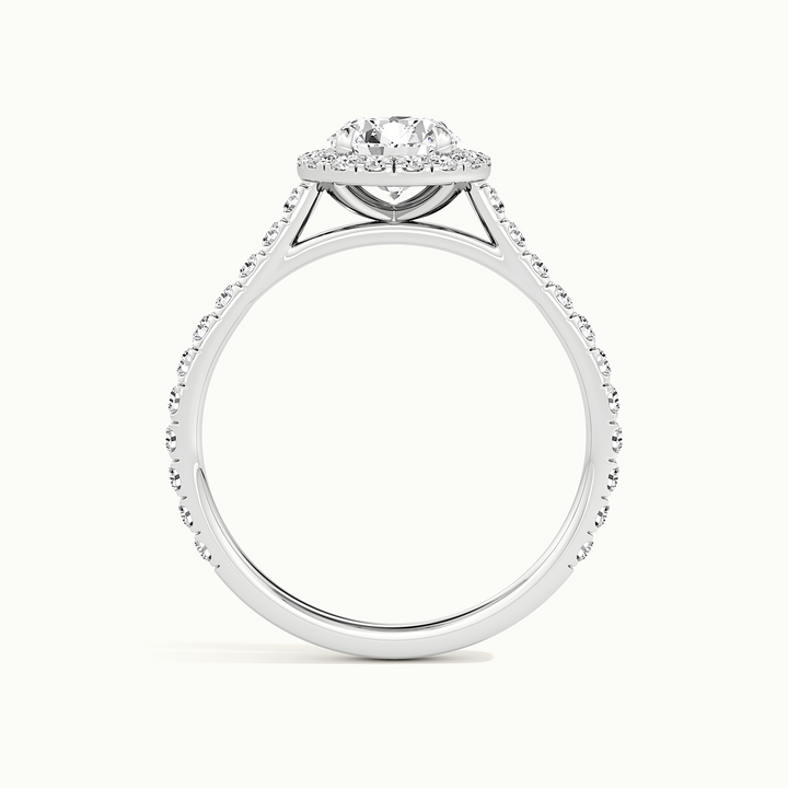 White gold round brilliant-cut halo pave engagement ring, side profile showing setting height