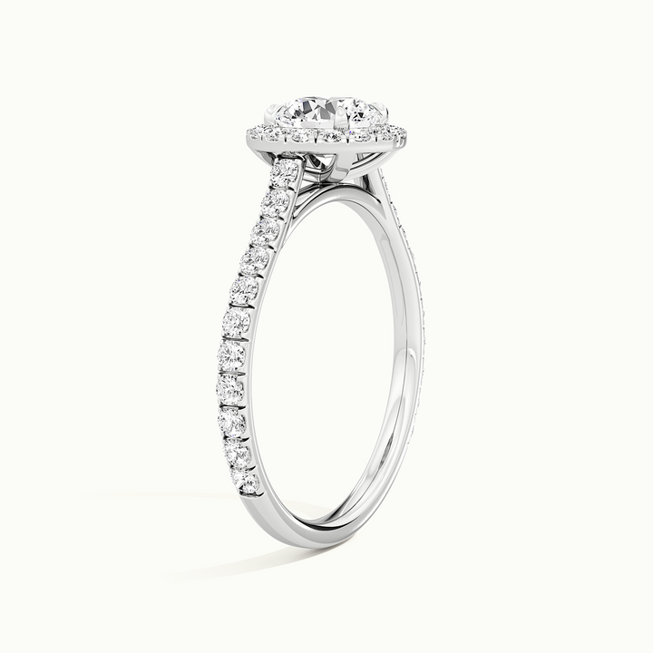 White gold round brilliant-cut halo pave engagement ring, raised three-quarter view of the setting