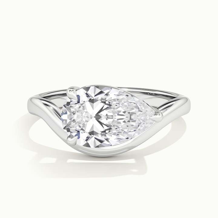 White gold pear-cut east-west solitaire engagement ring, front view
