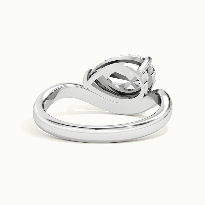 White gold pear-cut east-west solitaire engagement ring, rear view showing the setting gallery