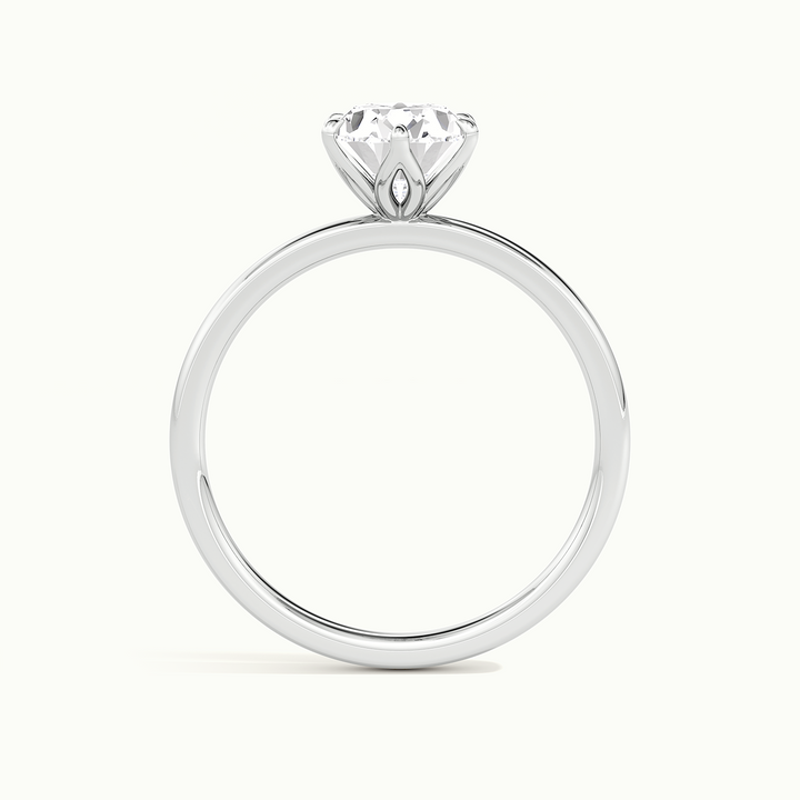 White gold oval-cut tulip setting engagement ring, side profile showing setting height