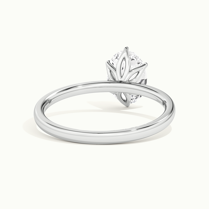 White gold oval-cut tulip setting engagement ring, rear view showing the setting gallery