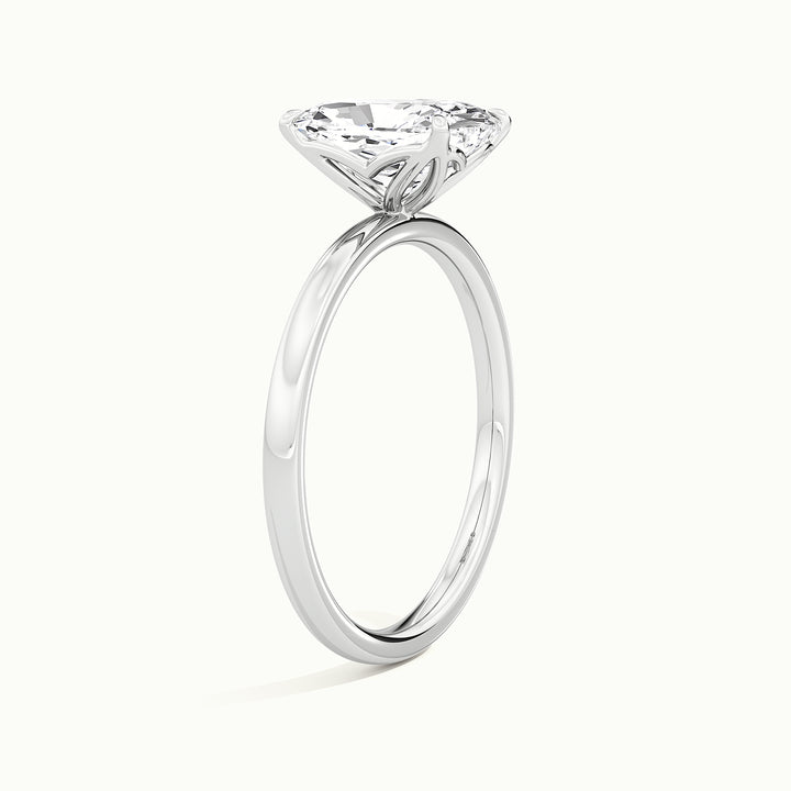 White gold elongated cushion-cut tulip setting engagement ring, raised three-quarter view of the setting