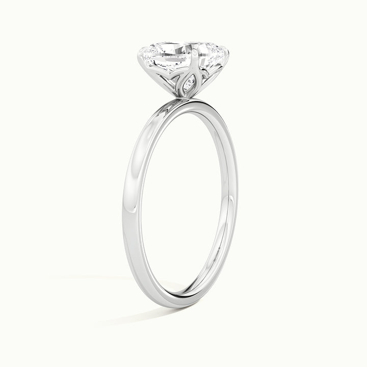 White gold cushion-cut tulip setting engagement ring, raised three-quarter view of the setting