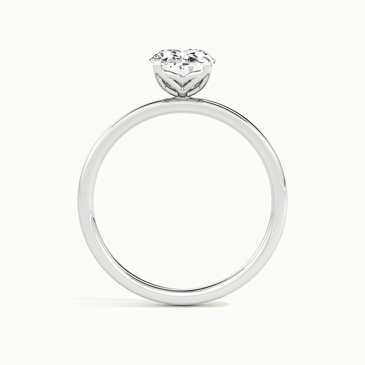 White gold oval-cut tulip setting engagement ring, side profile showing setting height