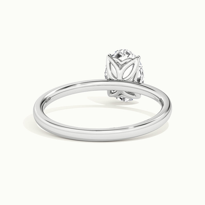 White gold oval-cut tulip setting engagement ring, rear view showing the setting gallery