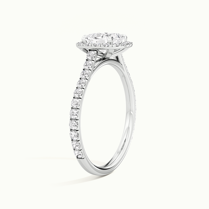 White gold cushion-cut halo pave engagement ring, raised three-quarter view of the setting