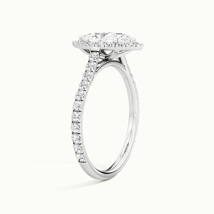 White gold marquise-cut halo pave engagement ring, raised three-quarter view of the setting