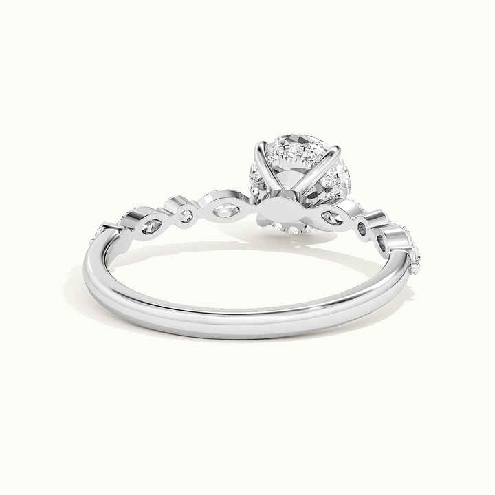 White gold round brilliant-cut hidden halo with marquise and round side stones, rear view showing the setting gallery