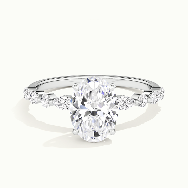 White gold oval-cut hidden halo with marquise and round side stones, front view
