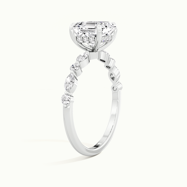 White gold Asscher-cut hidden halo with marquise and round side stones, raised three-quarter view of the setting