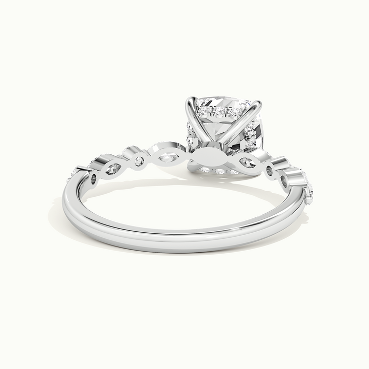 White gold cushion-cut hidden halo with marquise and round side stones, rear view showing the setting gallery