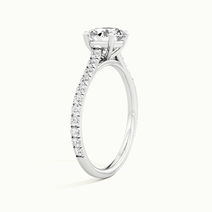 White gold round brilliant-cut cathedral pave hidden halo engagement ring, raised three-quarter view of the setting