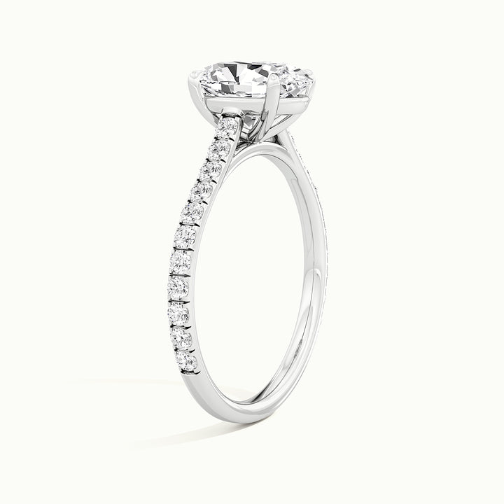 White gold oval-cut cathedral pave hidden halo engagement ring, side profile showing setting height