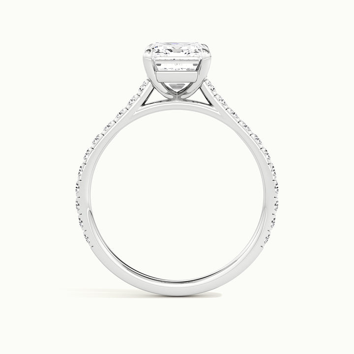 White gold emerald-cut cathedral pave hidden halo engagement ring, side profile showing setting height